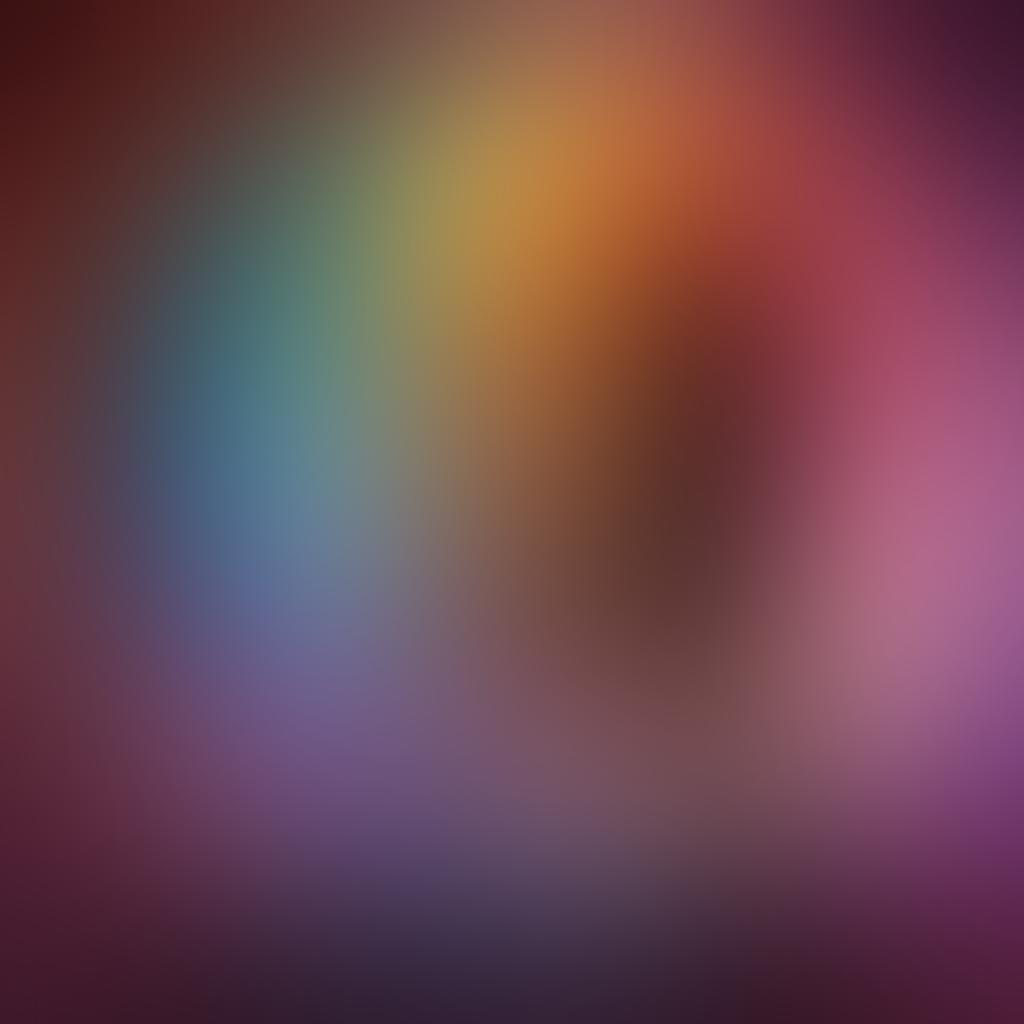 An abstract representation of a colorful spectrum flowing through a film reel, symbolizing various facets of sensuality and eroticism. Incorporate silhouettes of diverse couples in passionate poses intertwined within the spectrum, with modern streaming devices like tablets and TVs in the background. The design should have a soft, dreamy glow to evoke an intoxicating atmosphere around erotic films. Use vibrant colors that transition smoothly across the spectrum. super-realistic. vibrant colors. abstract.